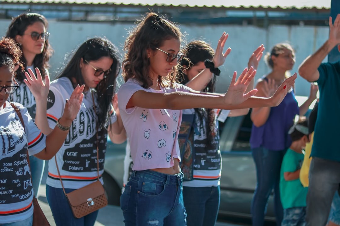 Brazilian woman speaking confidently to a small group
