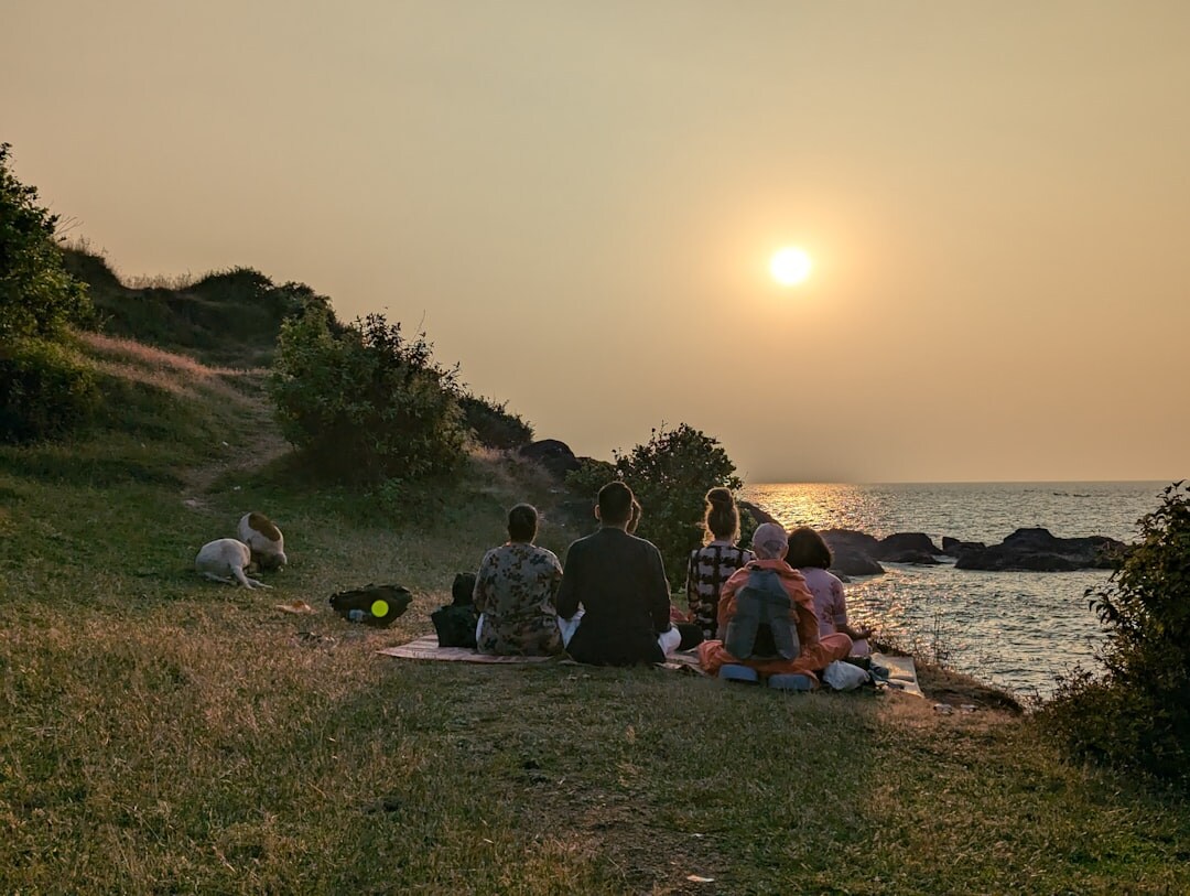 person meditating in serene nature