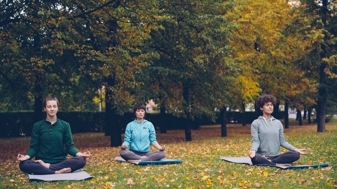 person meditating in serene nature